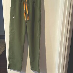 Figs moss color, size extra small. Only worn twice.